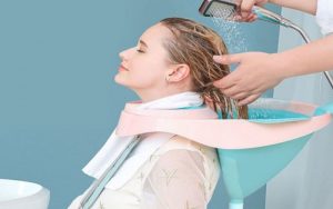 Gội đầu theo tư thế ngồi